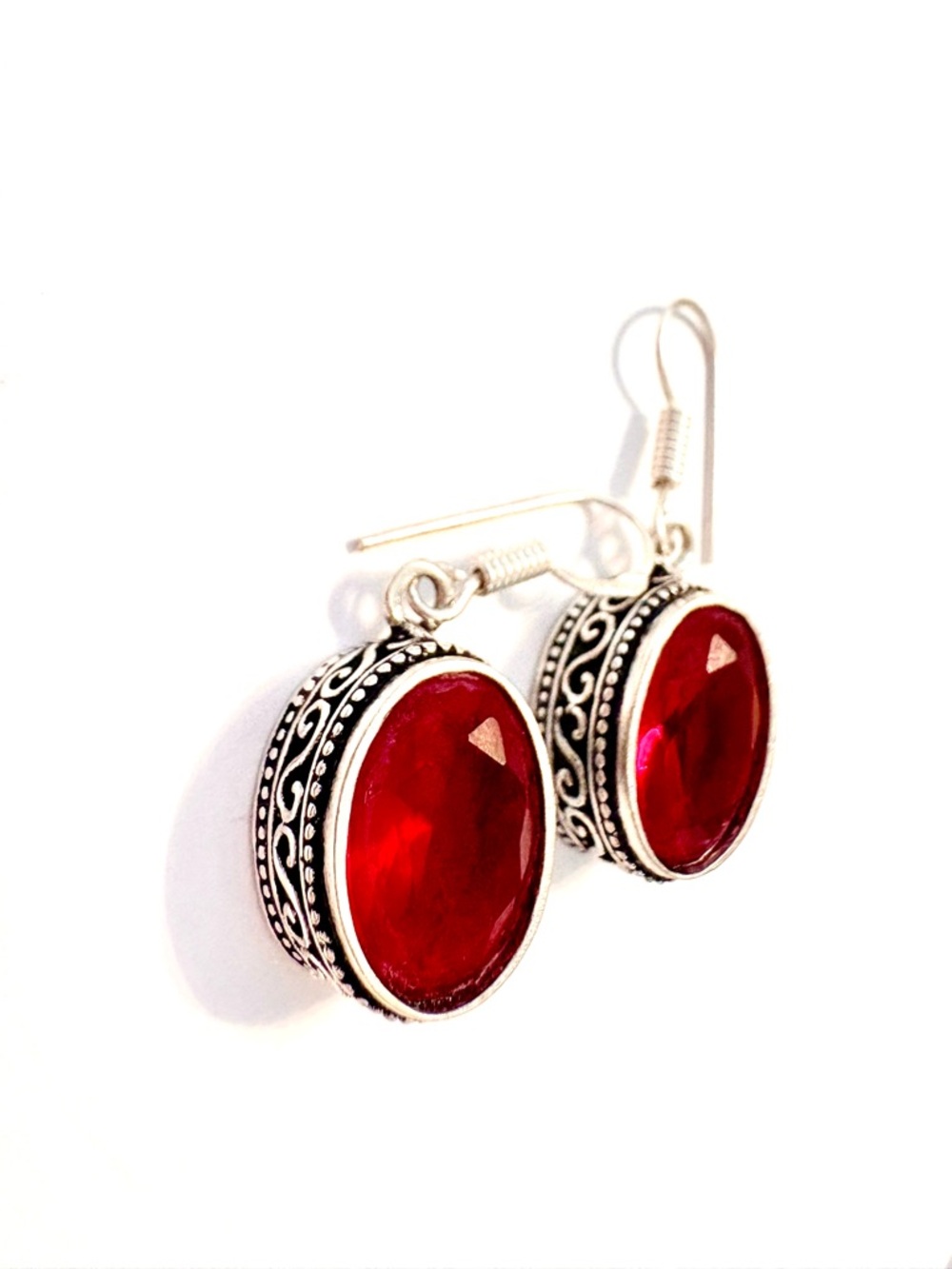 Beautiful, 925 marked, 1 1/4 inch, faceted Garnet earrings.